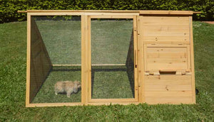 front view of hoppy hotel hutch with rabbit inside