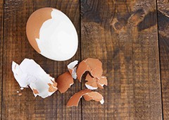 Boiled egg peeled on kitchen table