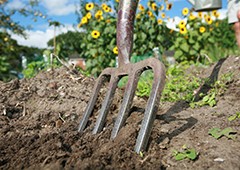 pitchfork-stuck-in-soil