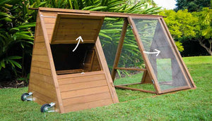 cluck house chicken coop showing large access doors