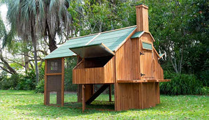mansion chicken coop showing nesting box open
