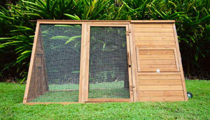 cluck house chicken coop with all doors closed