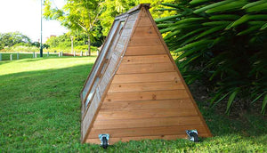 side view of cluck house chicken coop with wheels