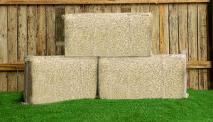 three bales of hemp bedding for chicken coop